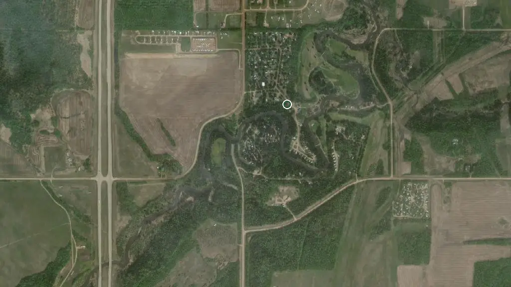 Aerial view of Riverbank Golf & RV Park and surroundings