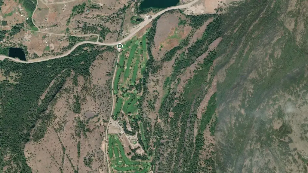 Aerial view of Twin Lakes Golf Resort and surroundings