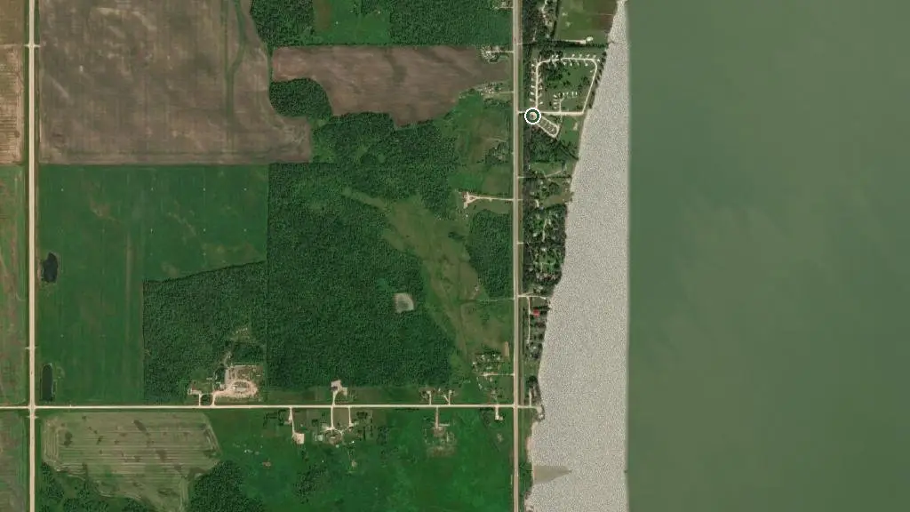 Aerial view of Hnausa Beach Campground and surroundings