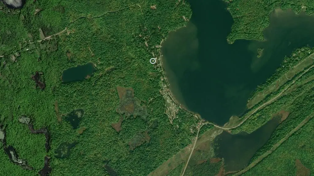 Aerial view of Loon’s Call Campground & Cottage Resort and surroundings