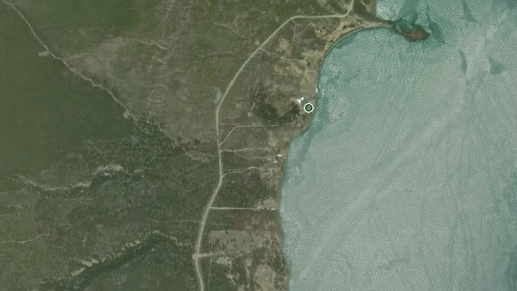 Aerial view of Woodlands Fishin Resort and Puntzi Lake Restaurant/Bakery and surroundings