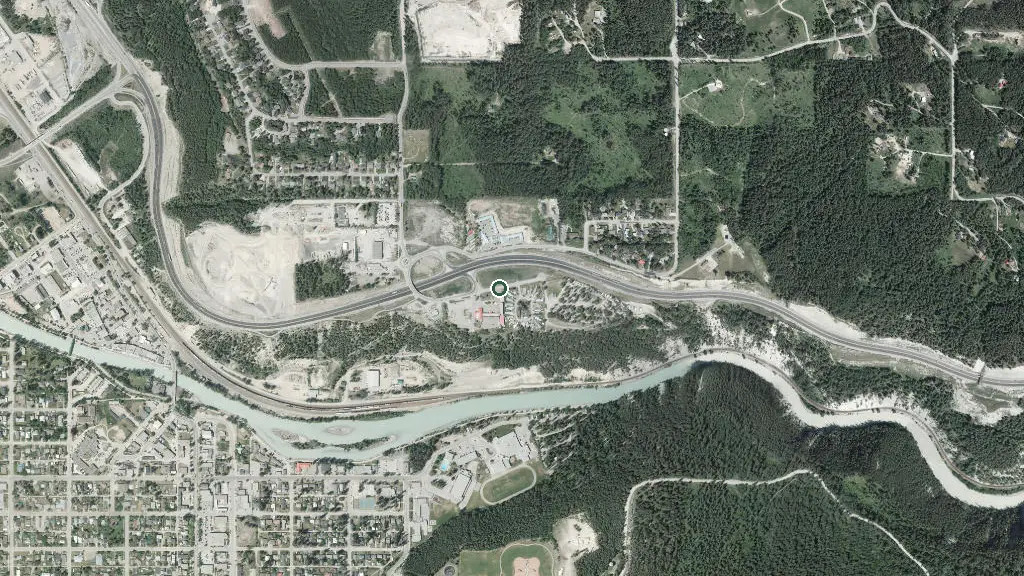 Aerial view of Whispering Spruce Campground & RV Park and surroundings