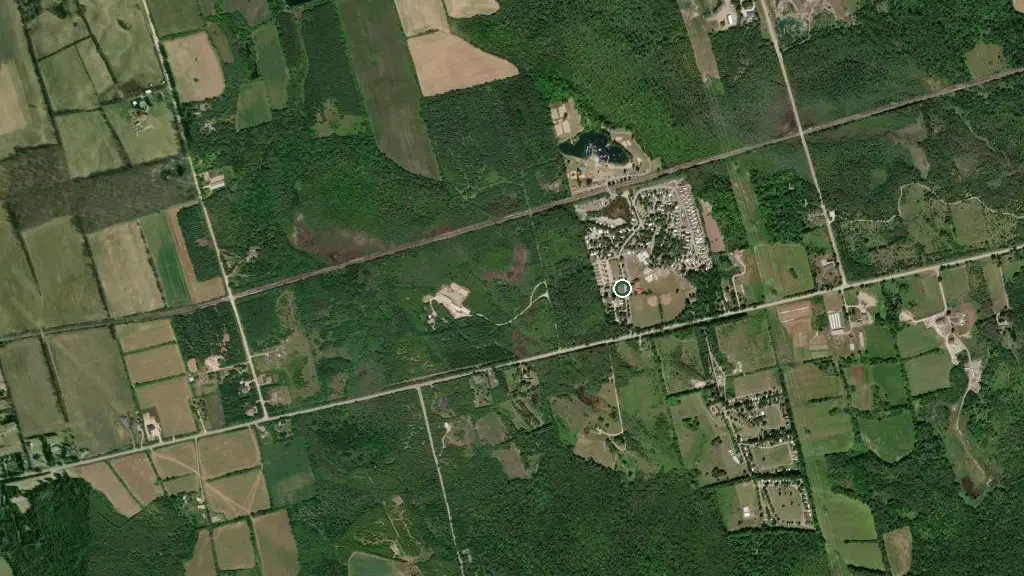 Aerial view of Emerald Lake Trailer Resort & Water Park and surroundings