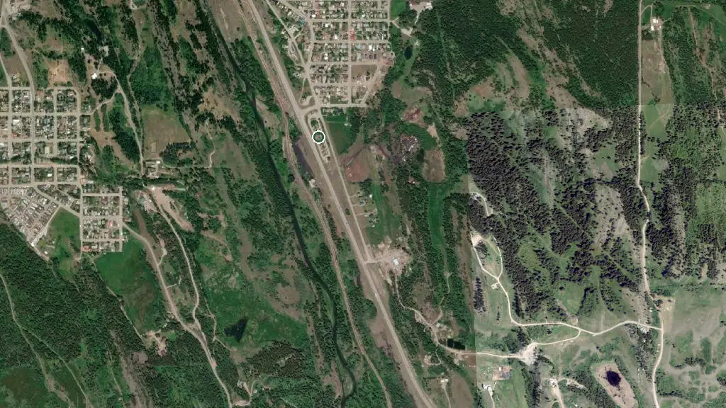 Aerial view of Bellevue Community Campground (Crowsnest Adventures Ltd.) and surroundings