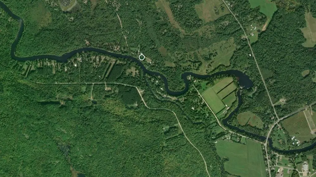 Aerial view of River's Edge Camping and surroundings