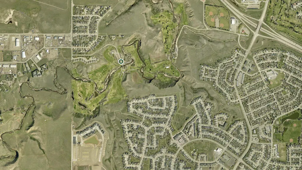 Aerial view of Cottonwood Coulee Golf & RV Park and surroundings