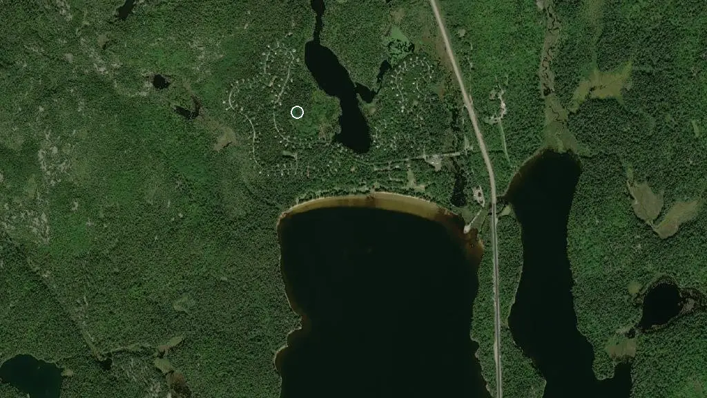 Aerial view of Halfway Lake - Hawksnest Campground and surroundings