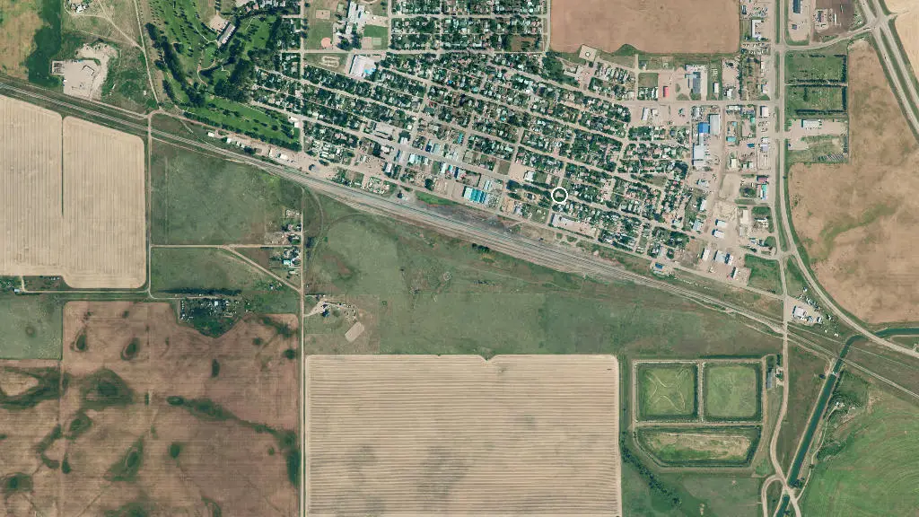 Aerial view of Bassano Homecoming Trailer Park and surroundings