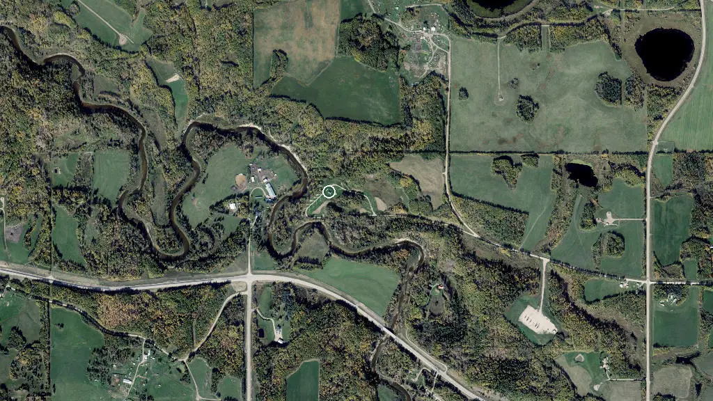 Aerial view of Modeste Creek Group Campground and surroundings