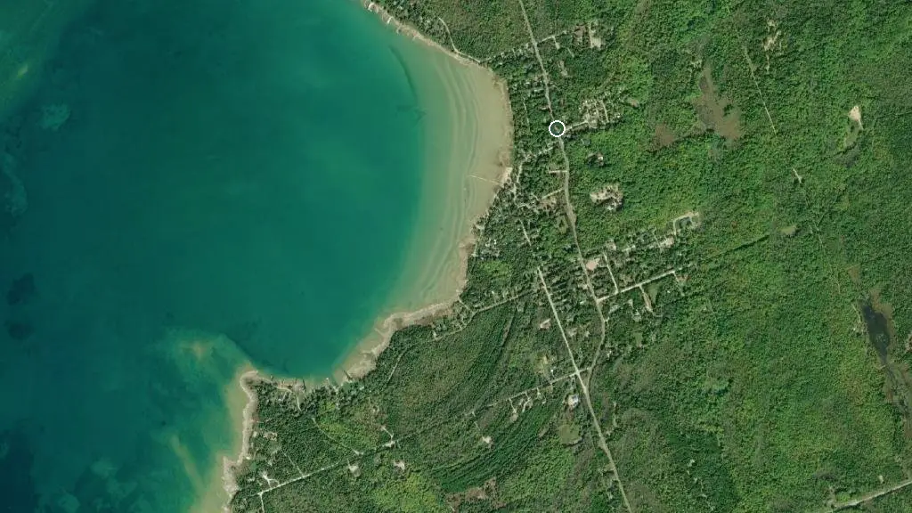 Aerial view of Red Bay Tent & Trailer Park and surroundings